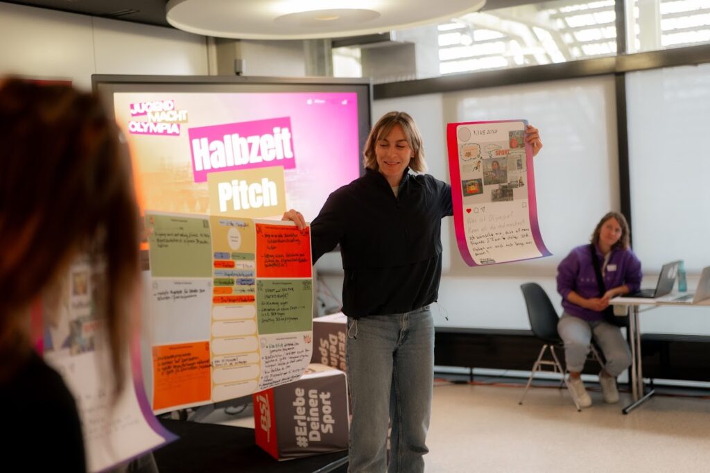 Leichtathletin Alexandra Burghardt bei der Ergebnispräsentation